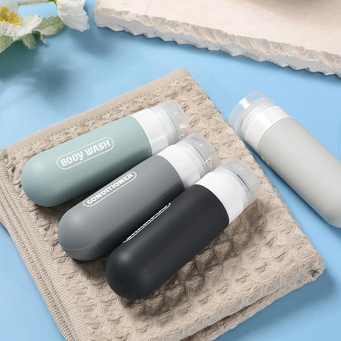 Silicone Travel Bottles for Toiletries with Labels, 3oz TSA Approved Squeezable Travel Size Containers, Leak Proof Travel Shampoo and Conditioner Bottles with Toiletry Bag (4 Pack, Dark Color)